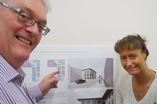 Howard Sykes and Hazel Gloster looking at the plans for the new health centre in Shaw